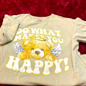 A light yellow color, panda design shirt, affordable